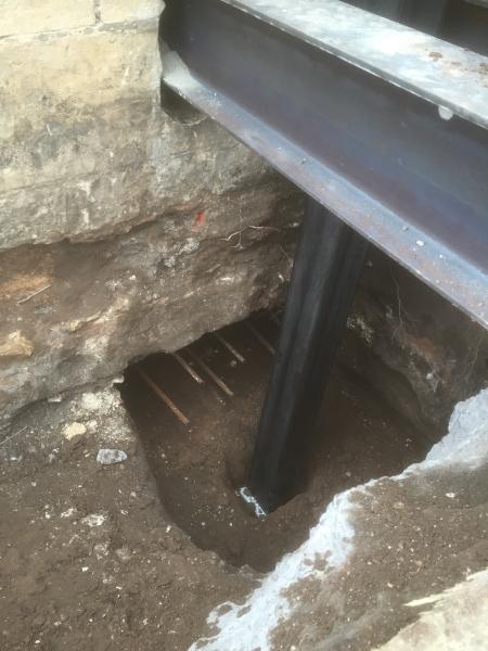 Excavations safely undertaken following temporary support of structure. Note: underpinning on opposi