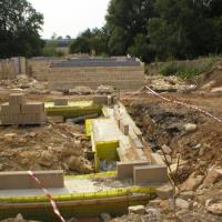 Completed piled ground beam with Pecafil Formwork at start of bricklaying process