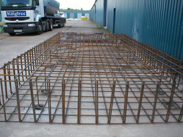 Steel Cased, 150mm Mini Piles and reinforcement cage to support new silos